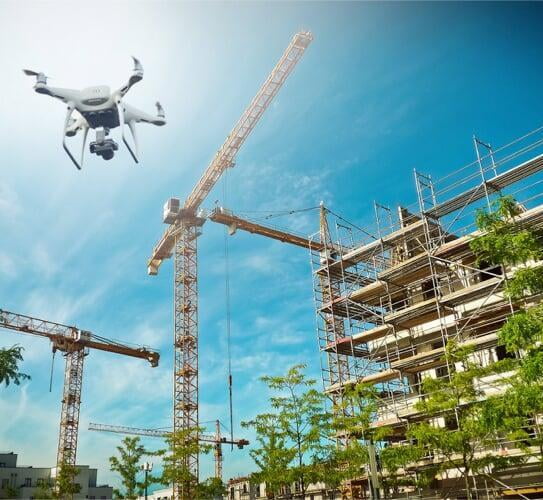 drone flying around construction site